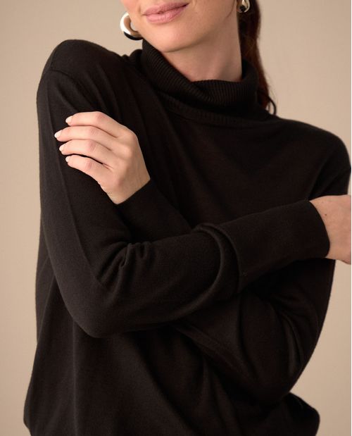 Buzo tejido de cuello alto para mujer