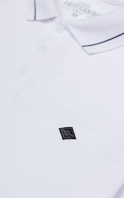 Polo con aplique en punto corazón para hombre