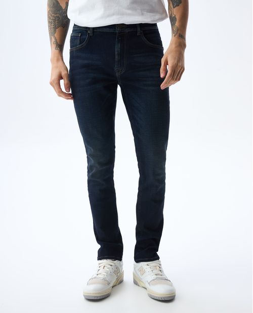 Jean Slim tono oscuro con desgastes para hombre