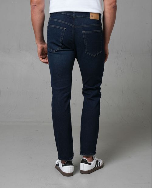 Jean slim tono oscuro para hombre