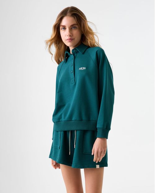 Buzo tipo polo con bordado en punto corazón para mujer