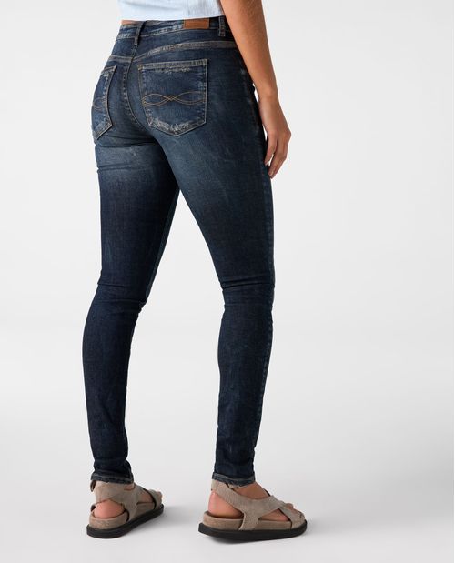 Jean Jegging tono oscuro con rotos para mujer