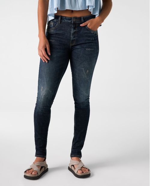 Jean Jegging tono oscuro con rotos para mujer
