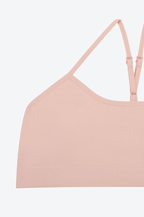 Top tipo seamless 100% feeling con tirantes cruzados