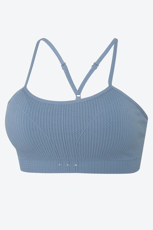 Top x2 tipo seamless con tirantes cruzados y textura espiga