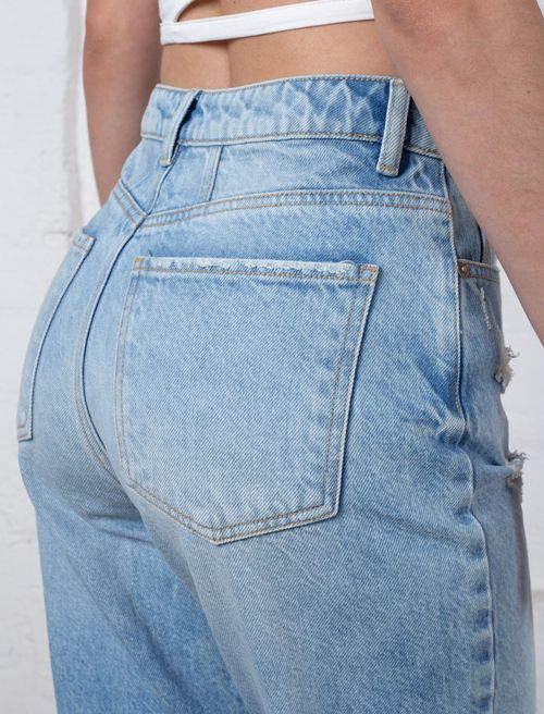 Jean fit Slouchy con desgastes frontales