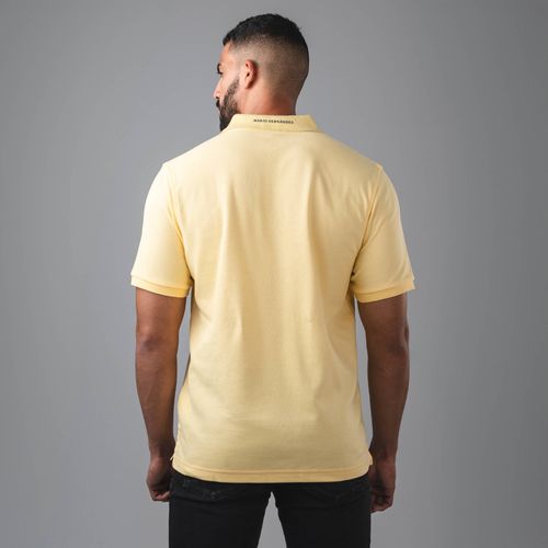 Camiseta polo insignia amarillo Tierra arriba