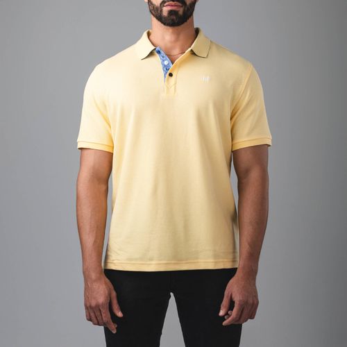 Camiseta polo insignia amarillo Tierra arriba