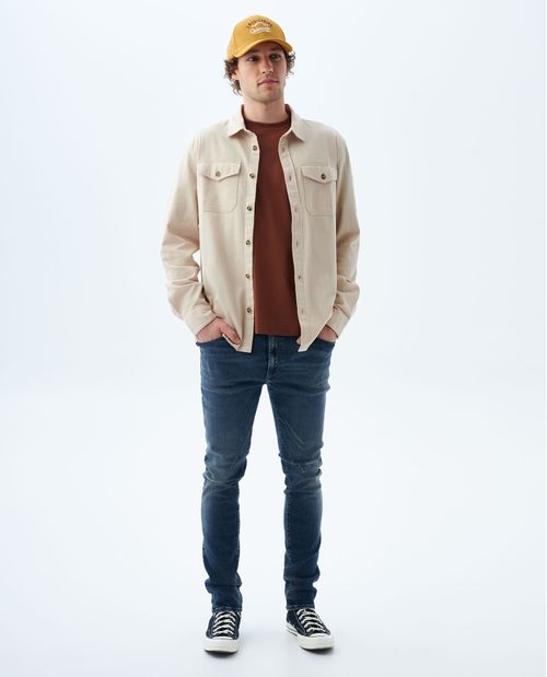 Jean Tapered  tono medio con tallones para hombre