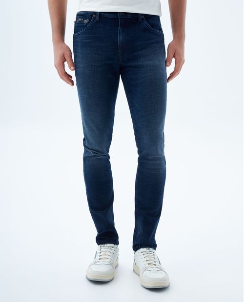 Jean slim tono oscuro con tallones para hombre