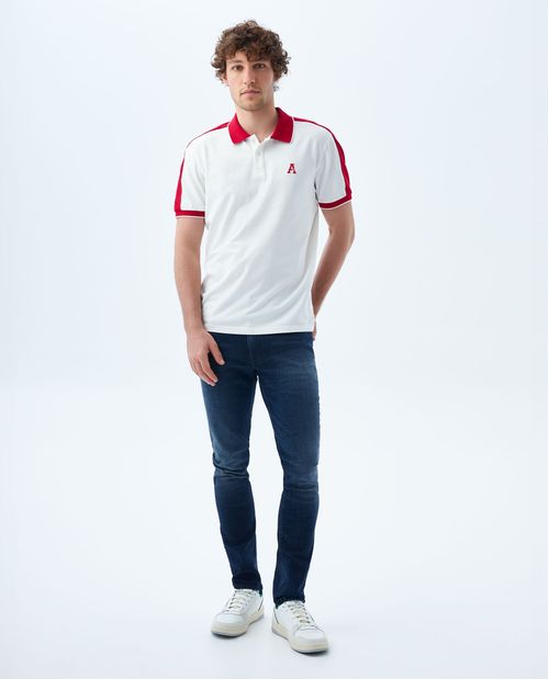 Jean slim tono oscuro con tallones para hombre