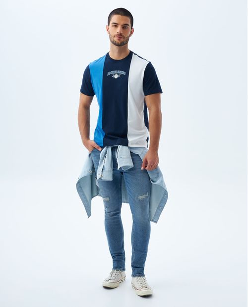 Jean Tapered tono medio con parches para hombre