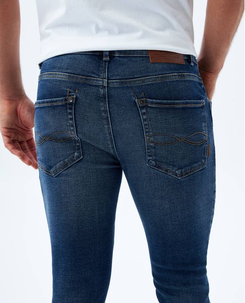 Jean Skinny tono medio con tallones para hombre