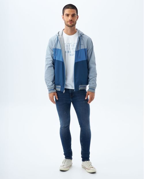Jean Skinny tono medio con tallones para hombre
